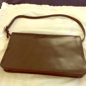 Women brown purse with shoulder strap